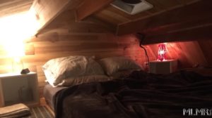 Lofted bed in a tiny home