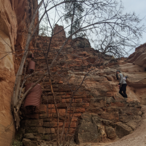 Hiker going up switchbacks on the Angel Landing Trail