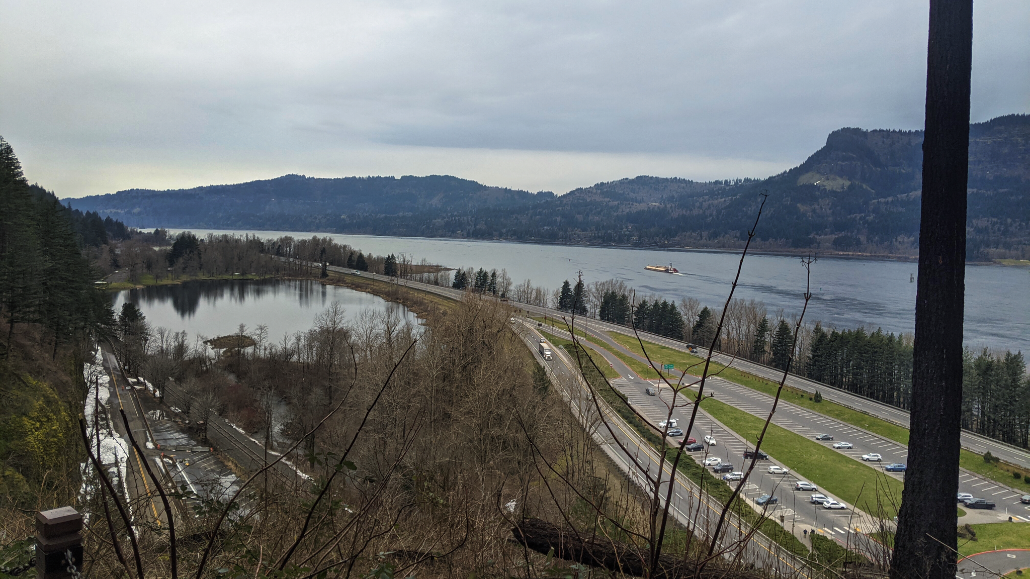 Overlook over Colombia River Gorge and highway while hiking Multnomah Falls